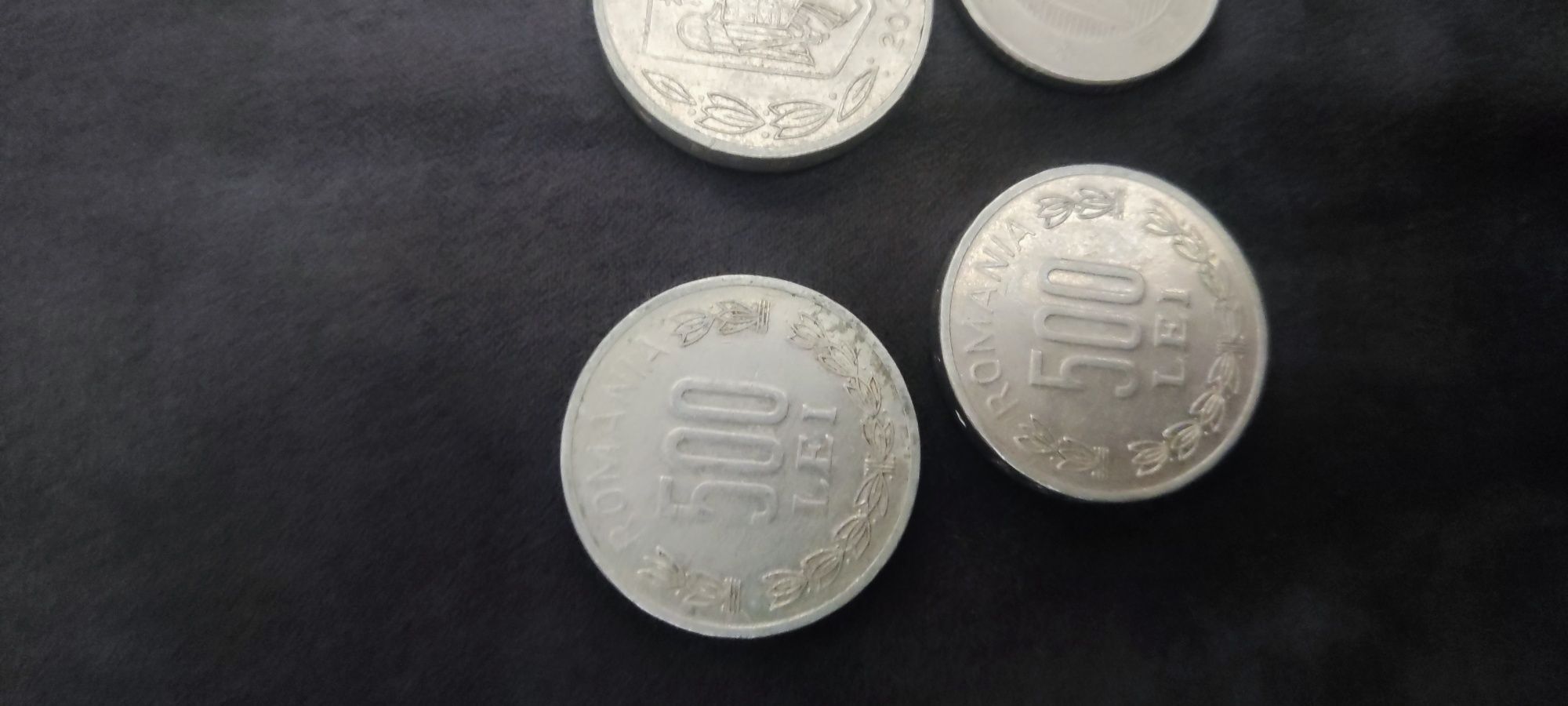 Moneda 100 lei și 500 lei