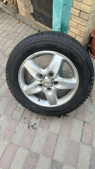 Диски оригинальные на Порше Каен с шинами Pirelli