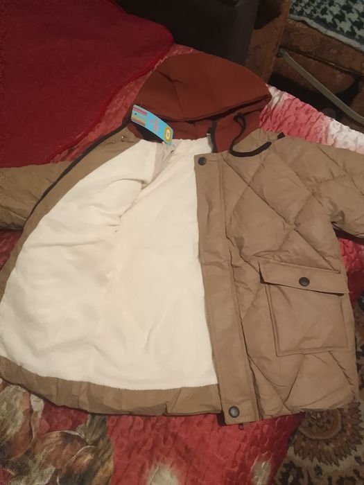 Продам курточку тёплую на мальчика.