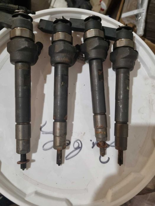 Дюзи с помпа за двигател N47 MINI и BMW