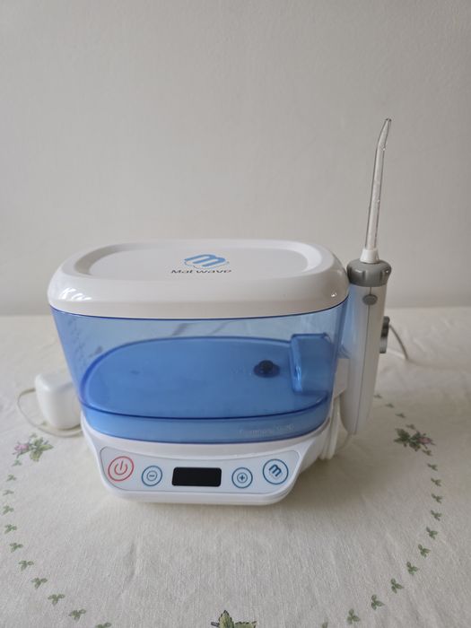 Irigator bucal - cu presiune fluctuanta