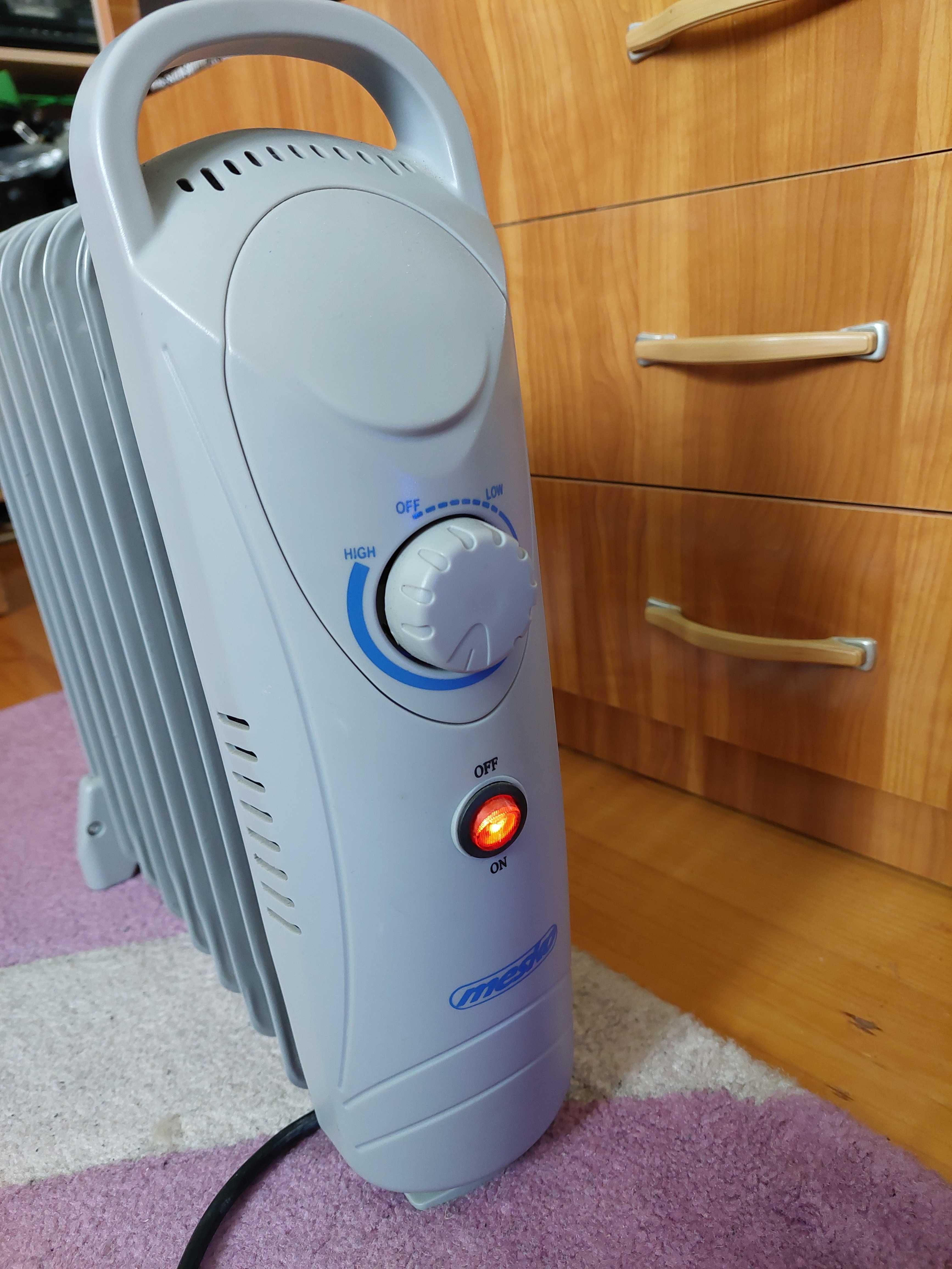 Calorifer electric cu ulei 9 elementi 1000w practic si economic