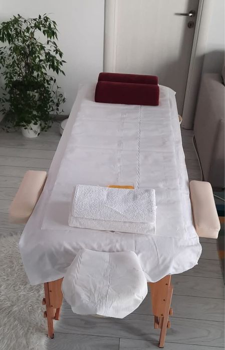 Vand masa de masaj cu toate accesoriile folosita - inca functionala