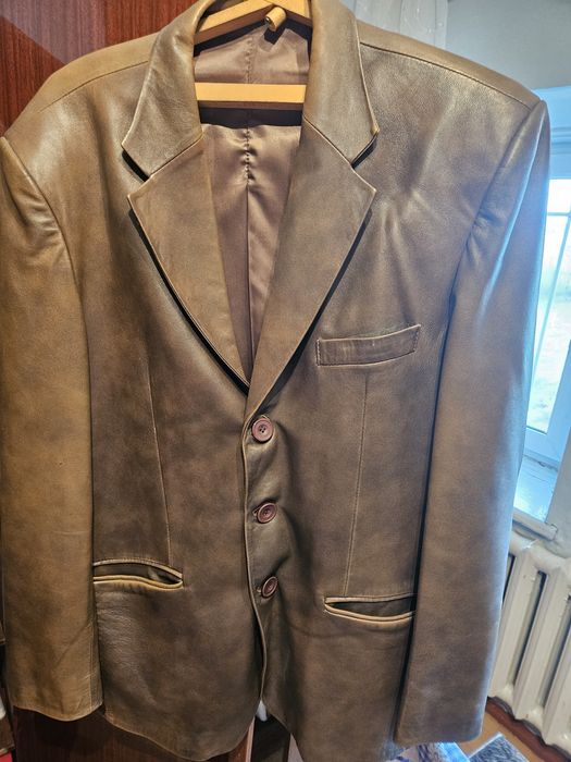 Кожаный пиджак .