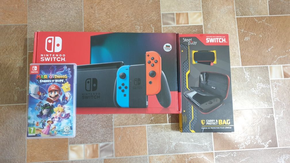 Конзола Nintendo Switch + калъфче + 2 игри Mario+Rabbids и Ringfit adv