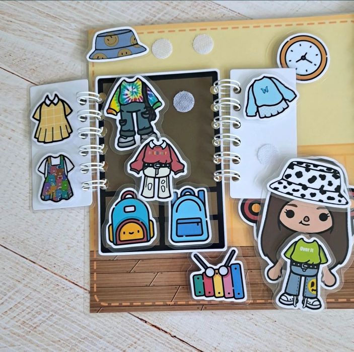 Joc educativ de tip carte „Toca Boca”.