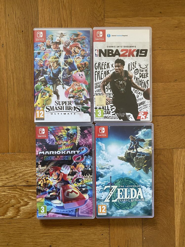 Nintendo Switch с 4 джойкона + 4 игри