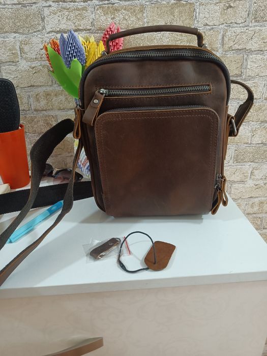 Продам новую мужскую сумку-барсетку из натуральной кожи