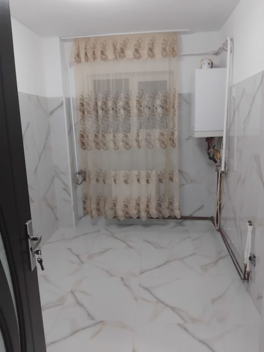 Apartament cu doua camere la parter