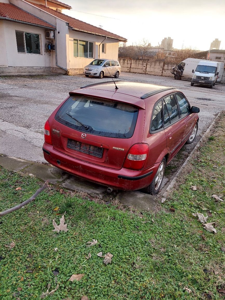 Мазда 323F на части