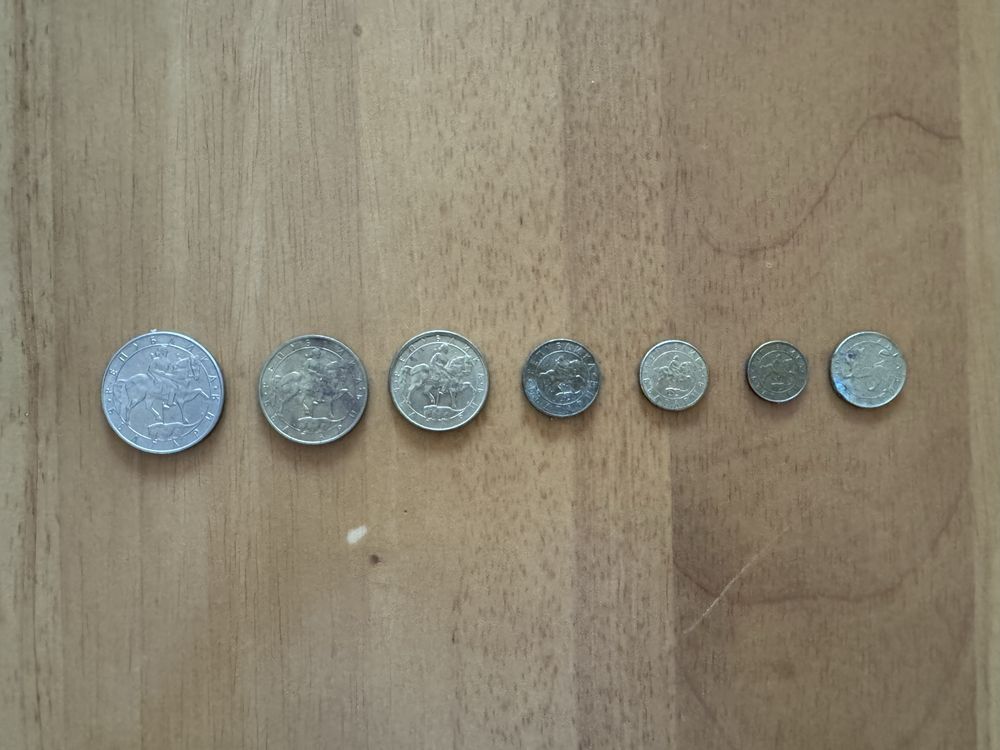 Монети от 50,20,10,5,2 лева и 20 стотинки