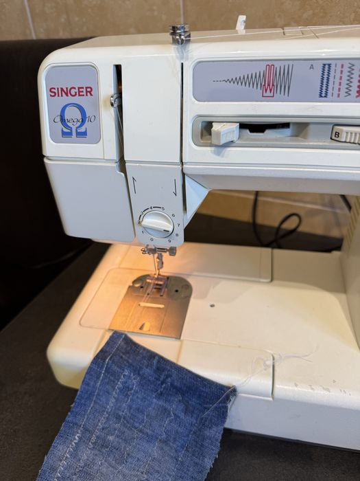 Masina de cusut si festonat automata SINGER diverse  programe