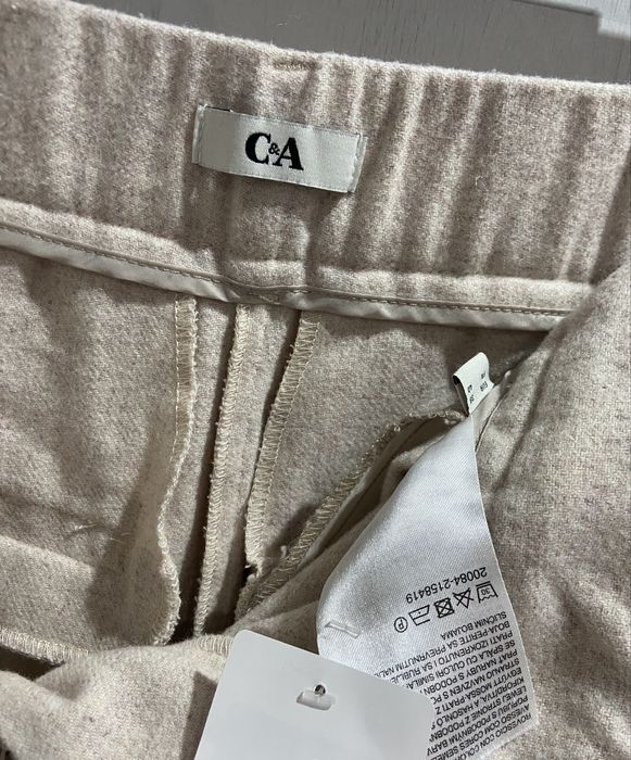 Pantaloni noi cu 47% lână, marimea 44