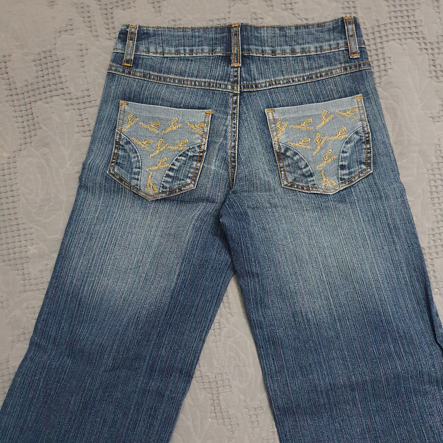 Женские брюки джинсы