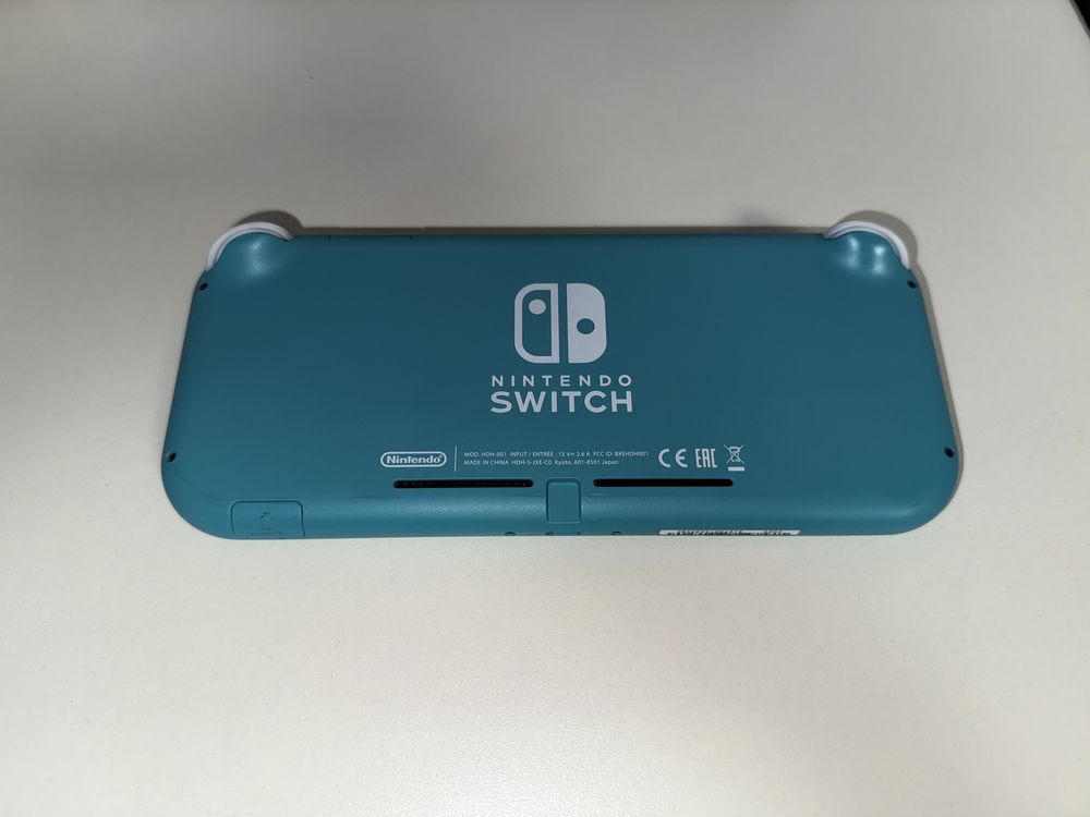 Nintendo Switch lite, turcoaz, functioneaza impecabil + husa + folie