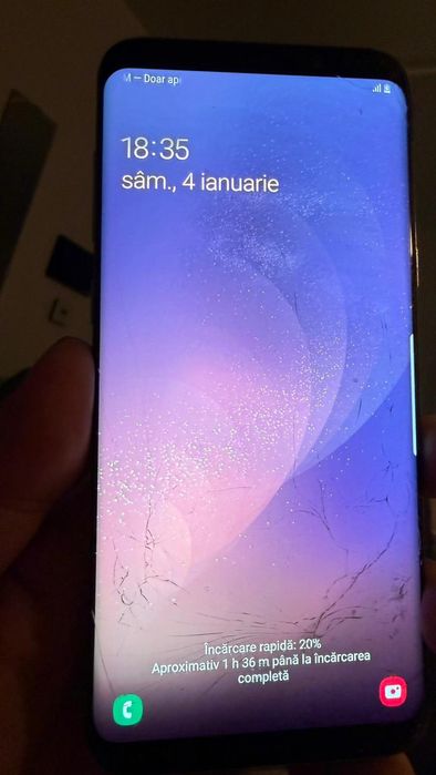 Telefon perfect funcțional dual fisuri fine nu afectează