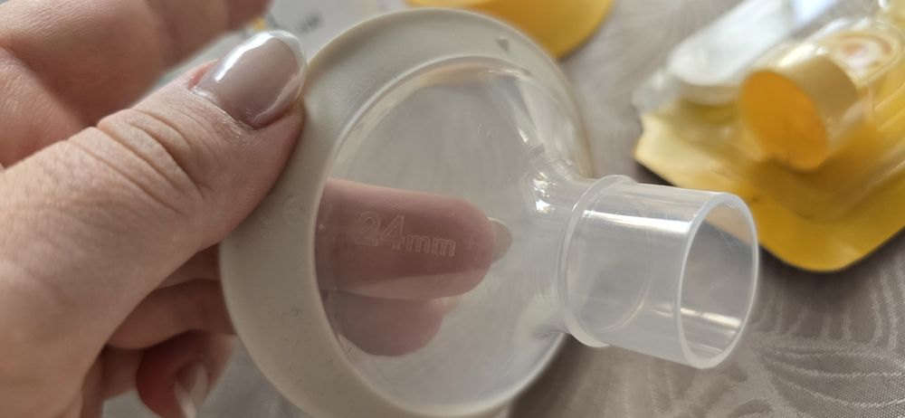 Ръчна помпа за кърма Медела и шишета