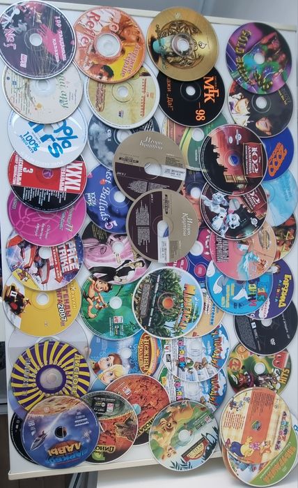 DVD мультфильмы, игры,,музыка mp3,кино
