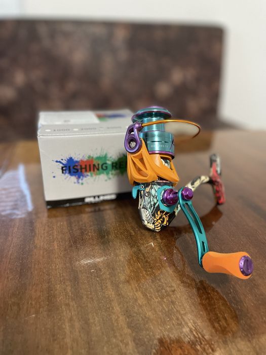 Спининг макара нова