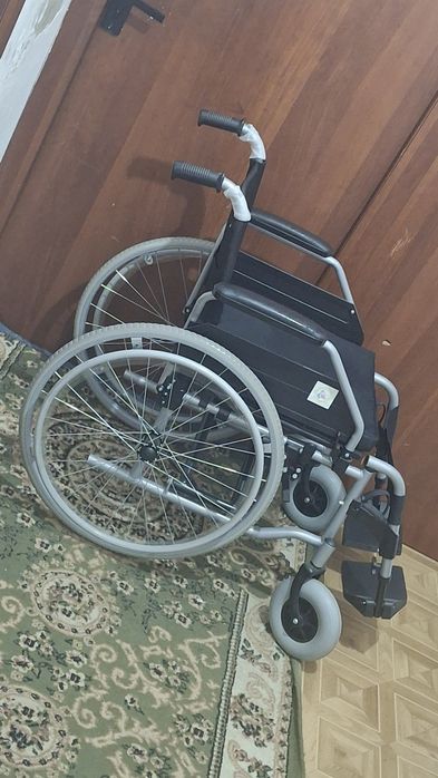 Инвалидная коляска