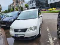 VW Touran TDI (I rosu)