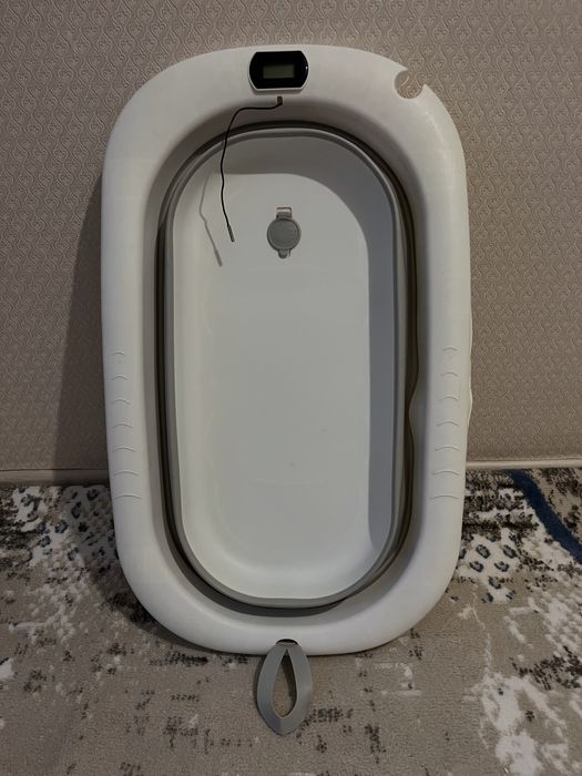 Ванночка для купания новорожденных складная с термометром