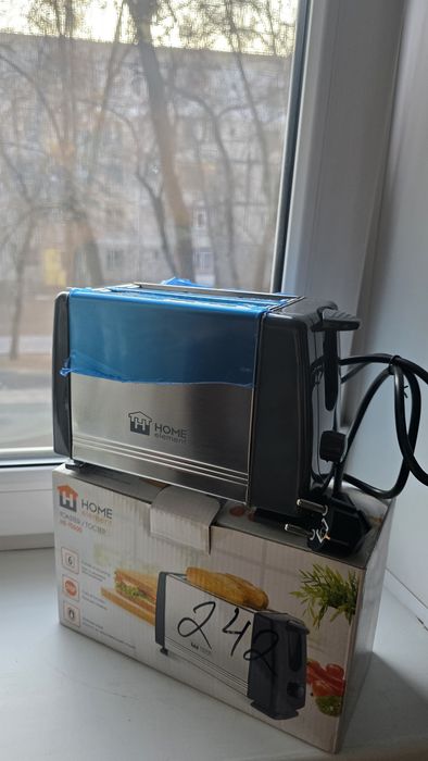 Продам НОВЫЙ тостер Home Element HE-TS500 серебристый, белый,лиловый.