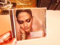 cd Jennifer Lopez -Como Ama Una Mujer, primul album lb.spaniola,Franta