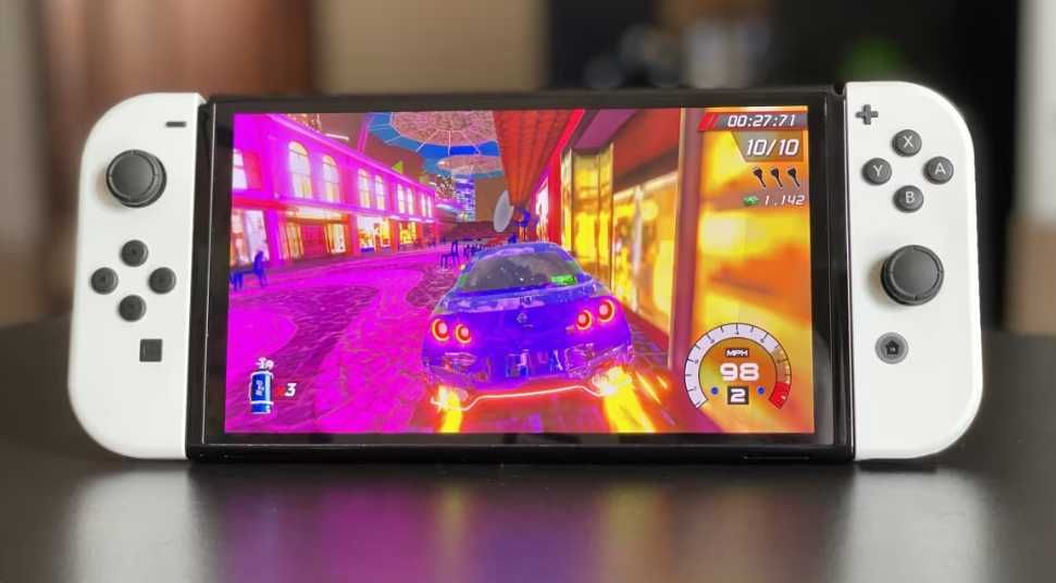 Consola Nintendo Switch OLED in cutie + Joc gen Pokemon sigilat !