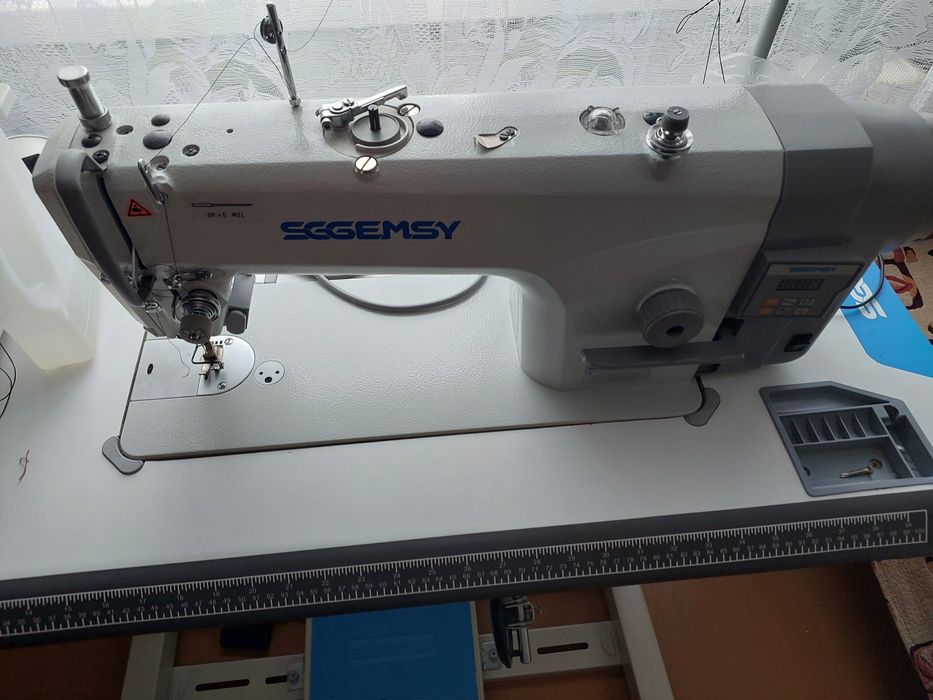 Швейную машинку.