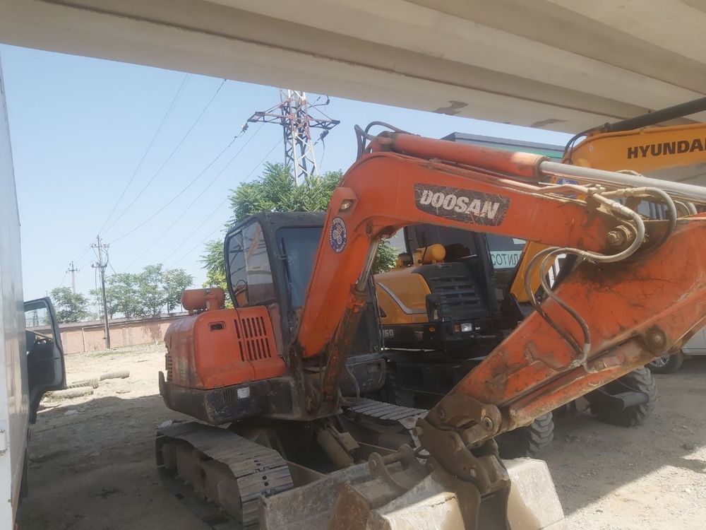 Doosan dx 55 gusinichniy mini ekskavator
