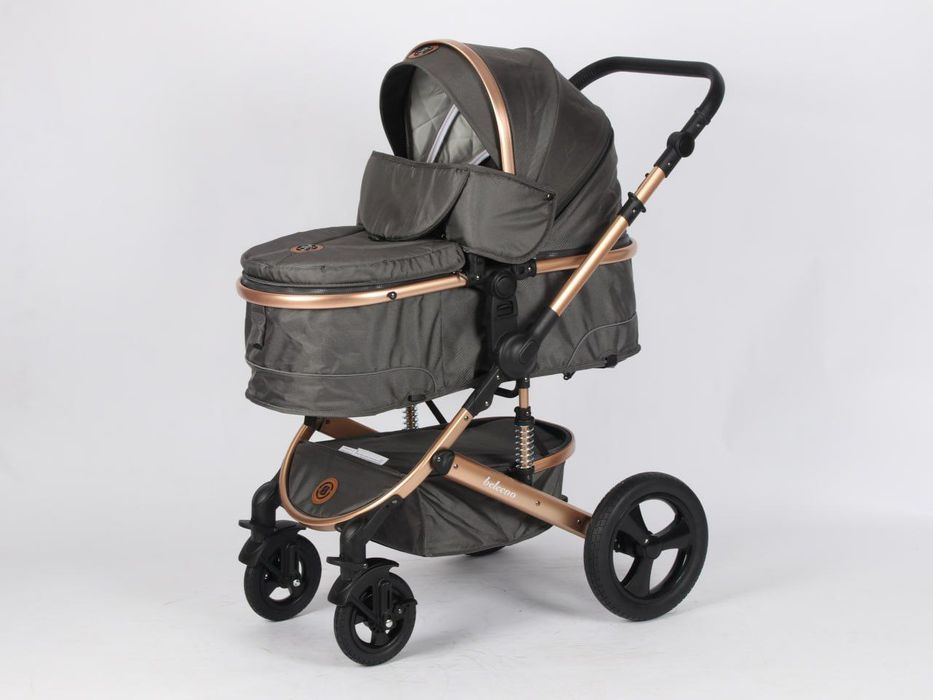 Коляска-люлька с поворотными колёсами и амортизацией (Belcoo)
