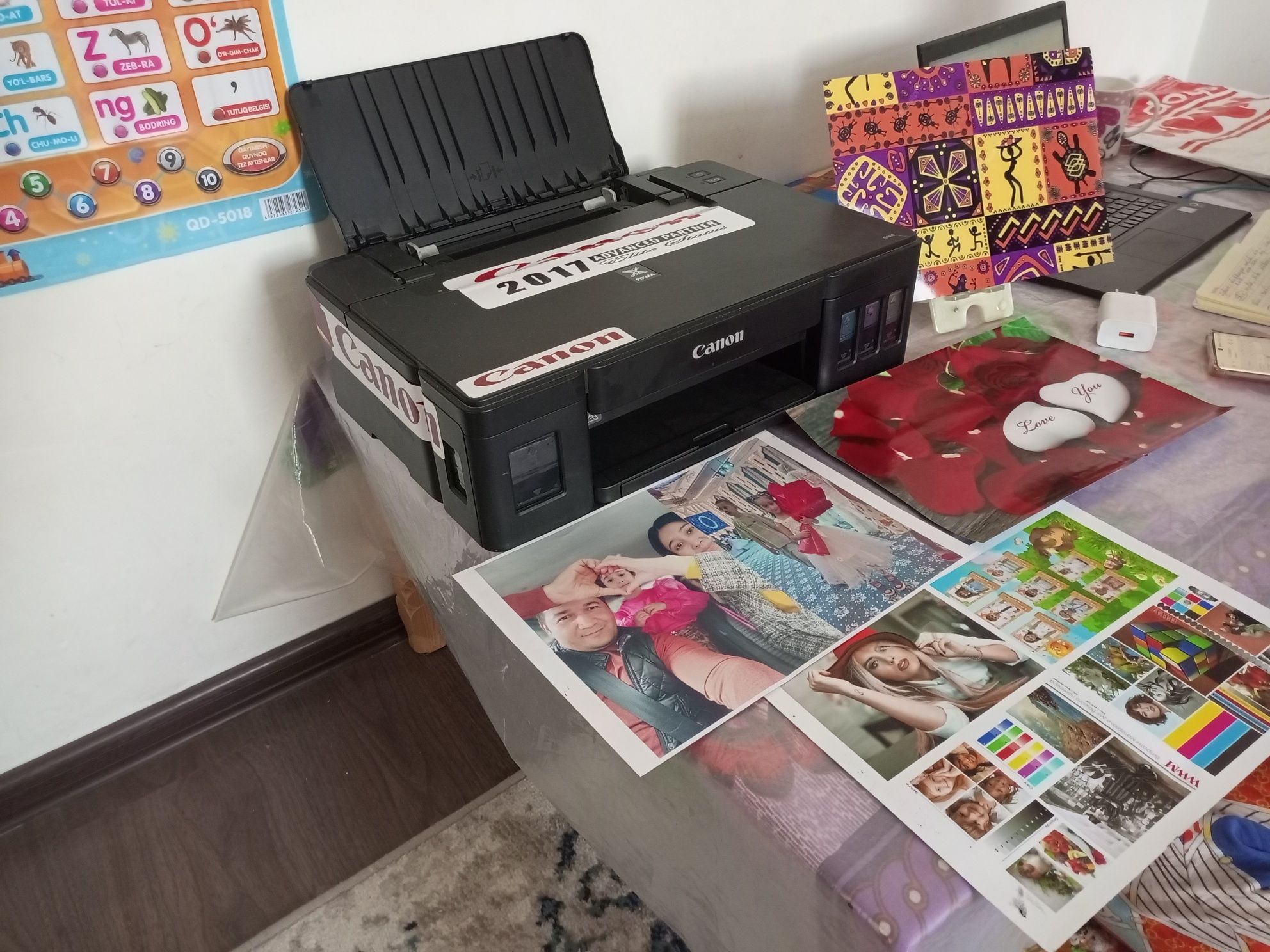 Canon rangli printr rasmga eyibor bering shu printer zaprafka qilingan