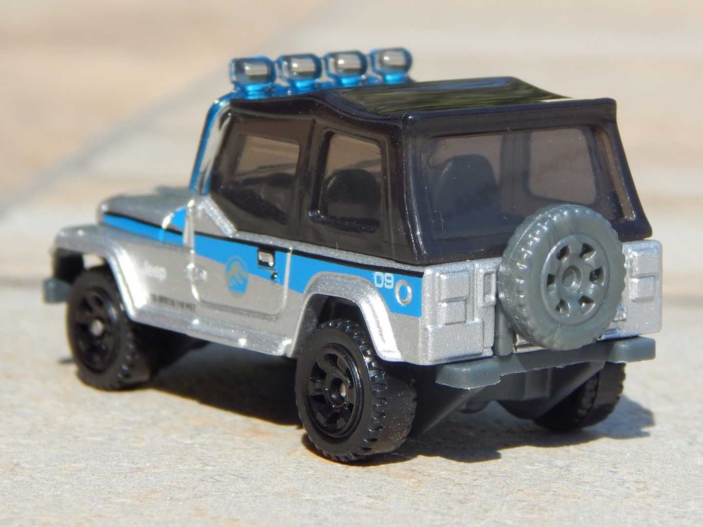 Macheta Jeep Wrangler Jurassic Park Edition Matchbox sc 1:64