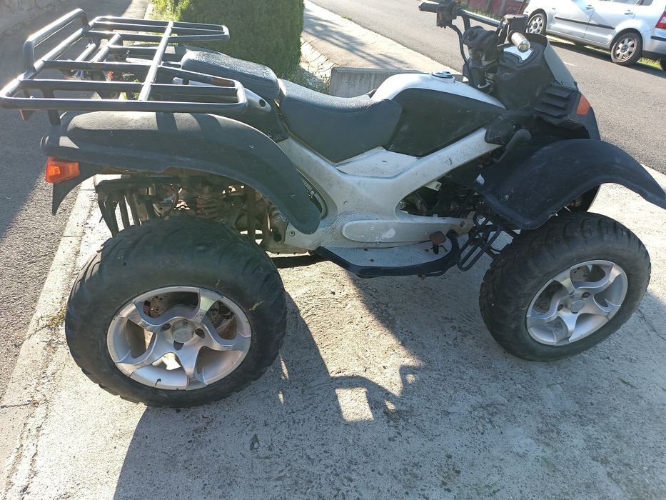 Vand/schimb ATV GSMOON 300 pt.piese s-au cine vrea sa-l repare.