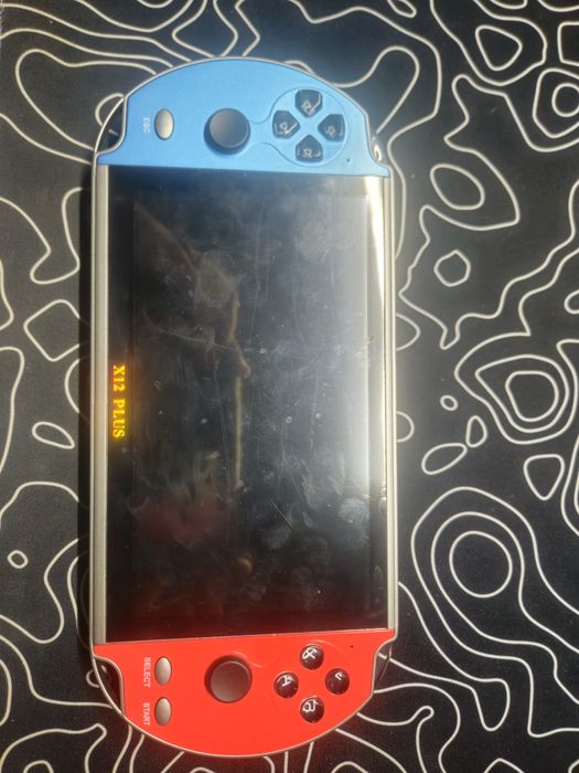 Портативная игровая приставка X12 PLUS