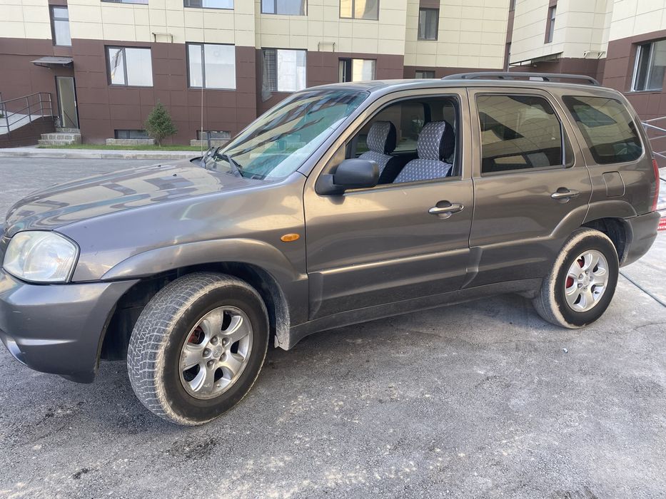 Мазда Трибют