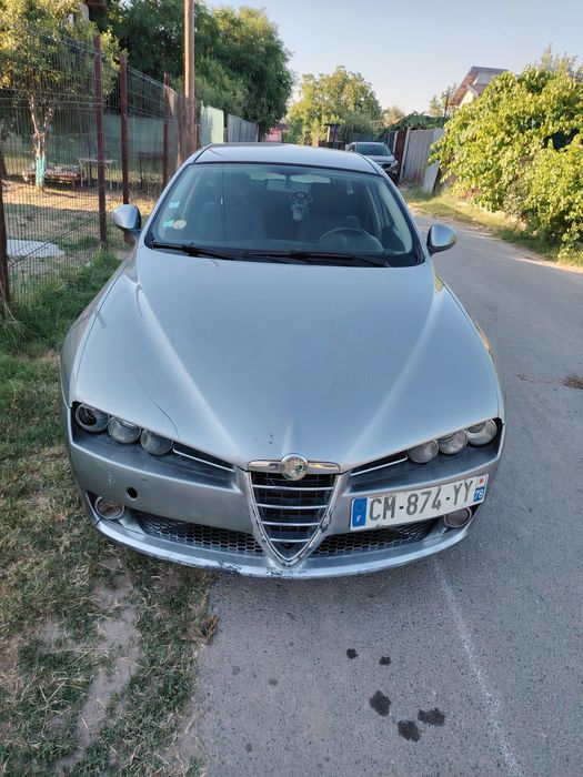 Vând sau schimb alfa Romeo
