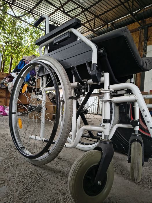 Инвалидная коляска