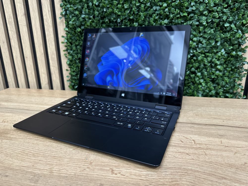 Laptop Trekstor Yourbook C11B , cu Amprenta si Touchscreen