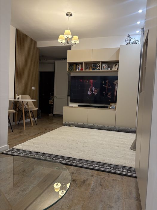 Apartament 2 camere modern, complet utilat si mobilat+loc de parcare