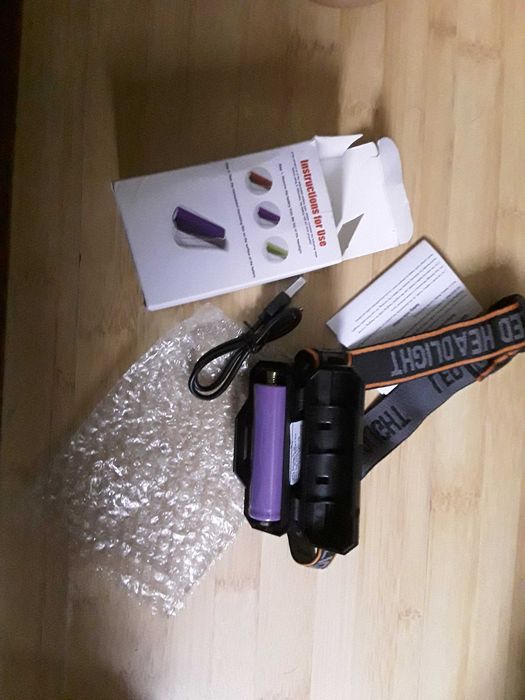 Laterna de cap cu acumulator 18650 NOUA