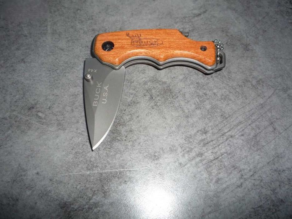 Briceag USA Buck x44, multifunctional, Maner lemn, desfacator bere etc