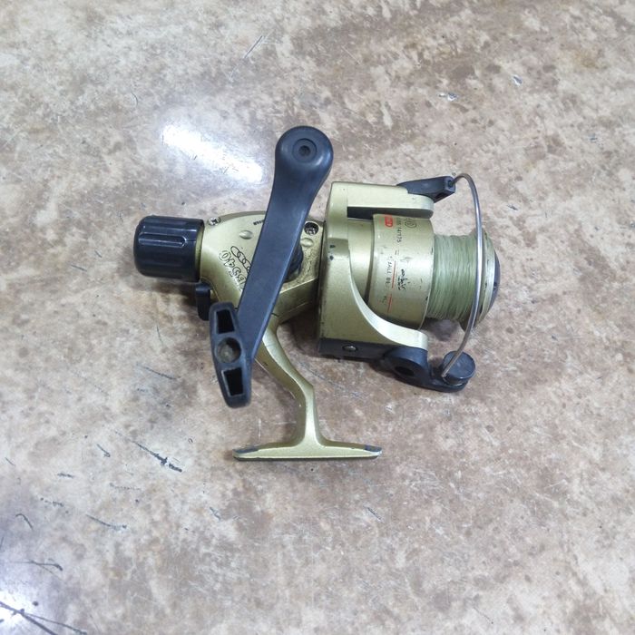 Рыболовная катушка в рабочем состоянии