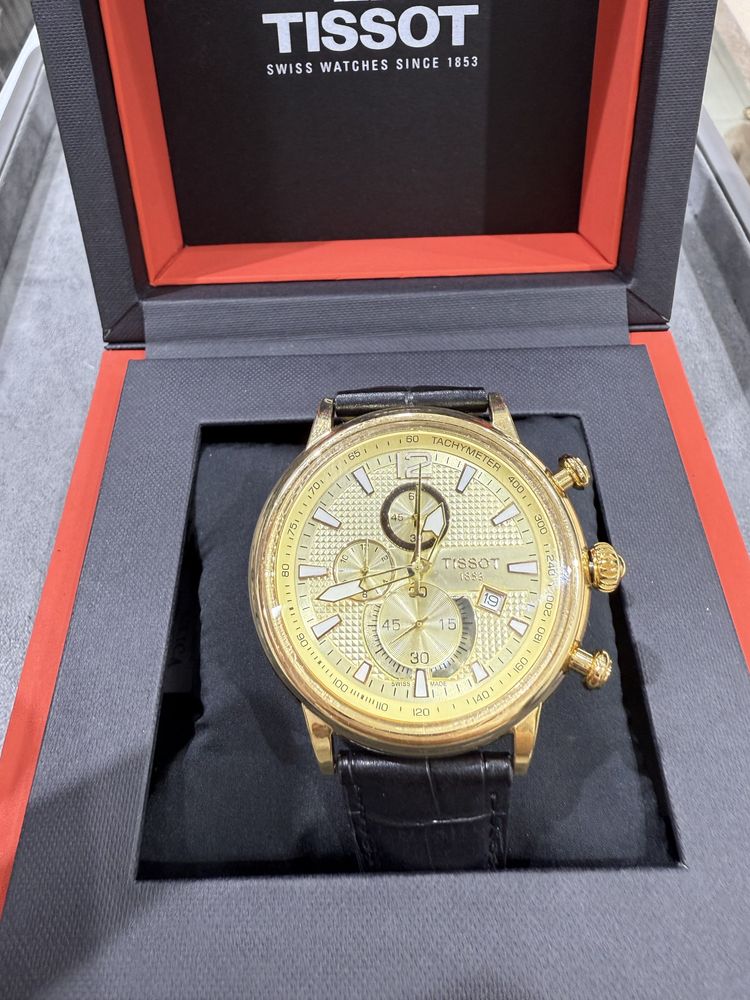 Золотые часы Tissot 750пробы