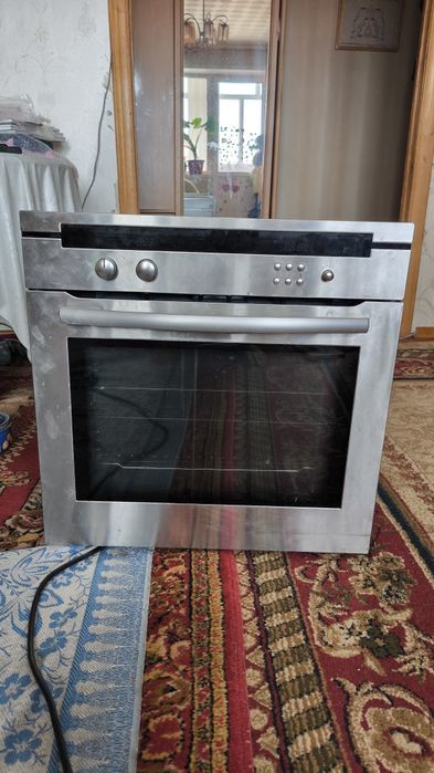 Продам встраиваемую электрически духовой шкаф LG