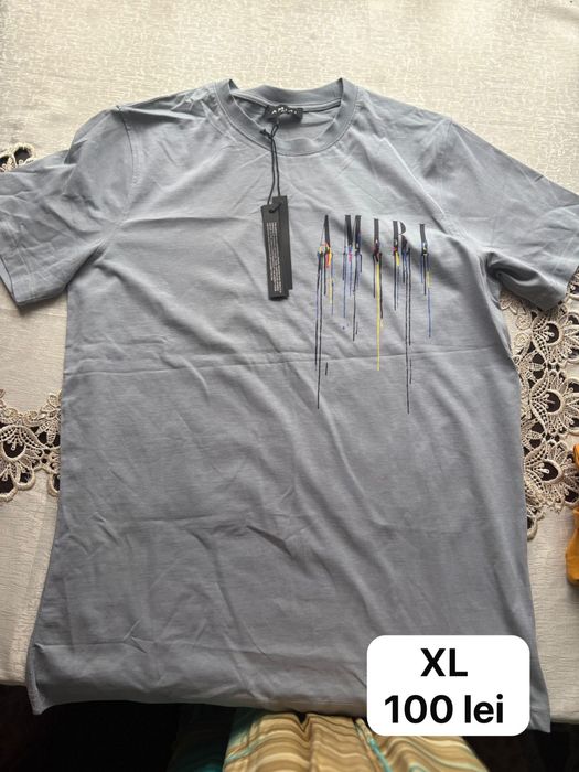 Tricouri diferite marimi