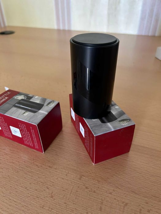 Deschizator automat de sticle pentru capace de sticle de bere