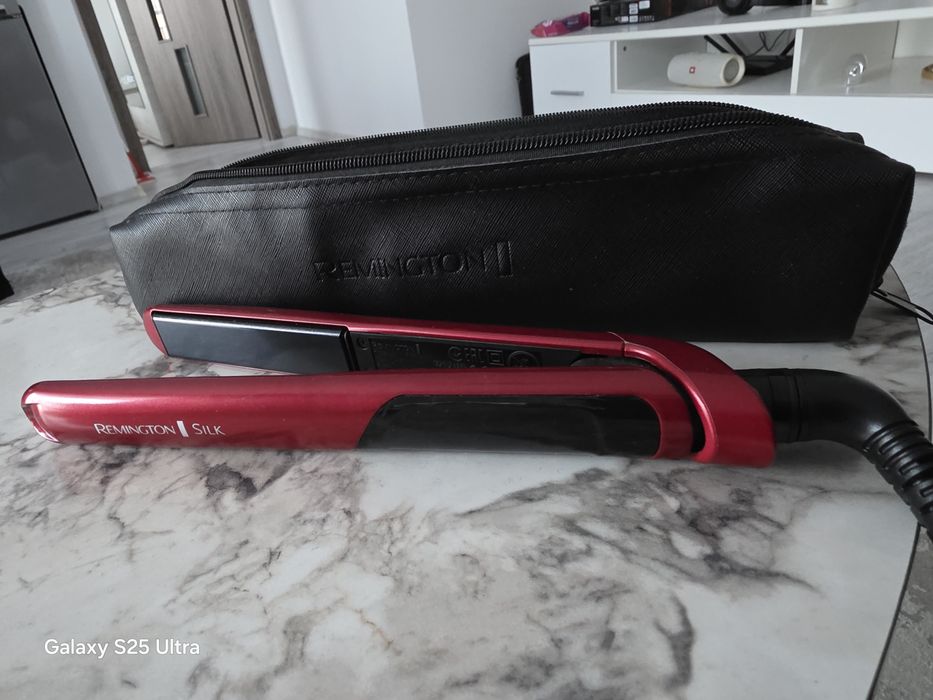 Placa de par Remington Silk S9600 240° in stare perfecta
