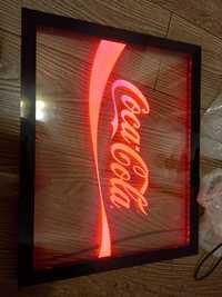 Firma luminoasa Coca-Cola